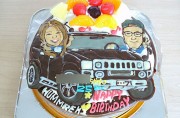 似顔絵と車のケーキ