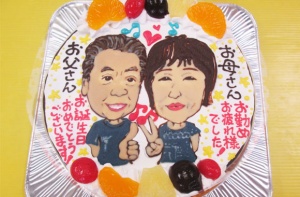 似顔絵還暦祝いケーキ