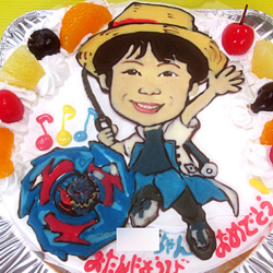 似顔絵とベイブレードのケーキ